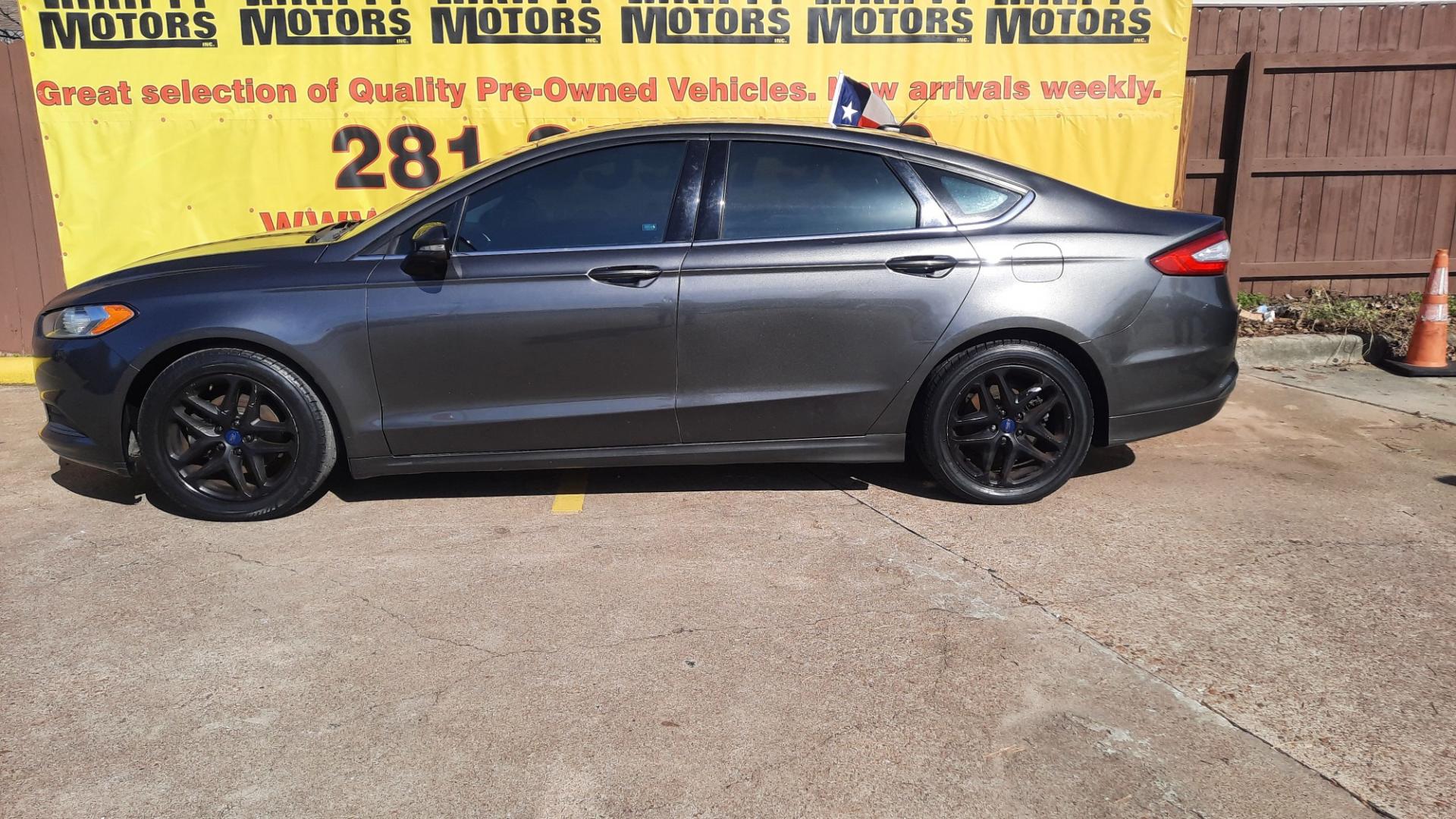 2016 Ford Fusion (3FA6P0H71GR) , located at 16710 Clay Rd., Houston, TX, 77084, (281) 859-7900, 29.834864, -95.656166 - Photo#1